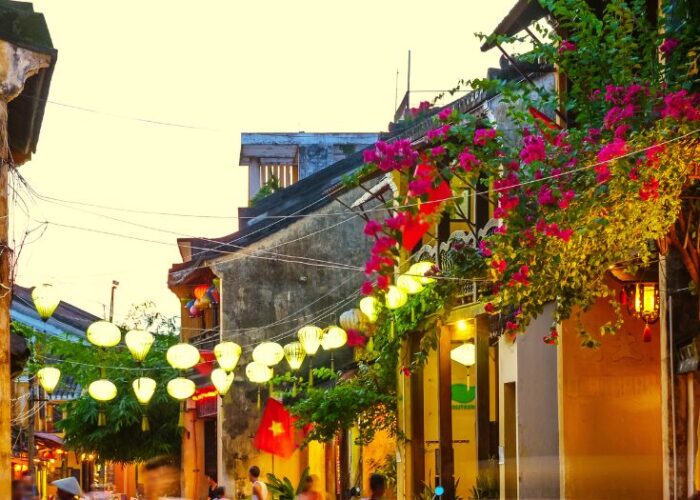 Blog Post Cover about fun vegan restaurants in hoi an vietnam, featuring a picture of a passage in hoi ain.