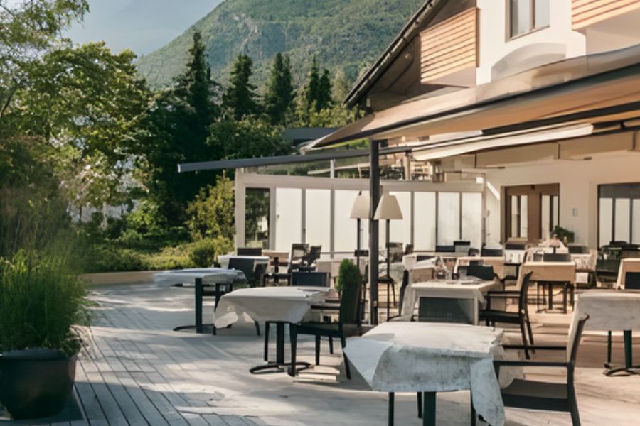 Vegan hotel Italy outdoor dining area with terrace seating