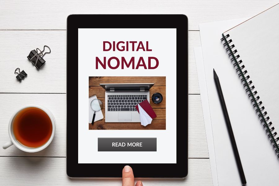 Vegan digital nomad working online on laptop and tablet