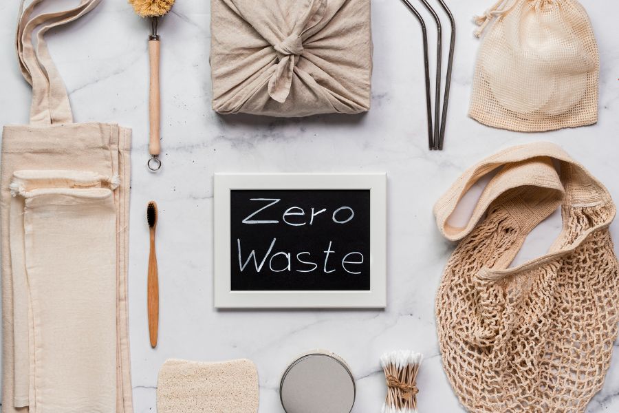 a shop display of zero waste products Zero waste travel essentials including reusable bags and straws