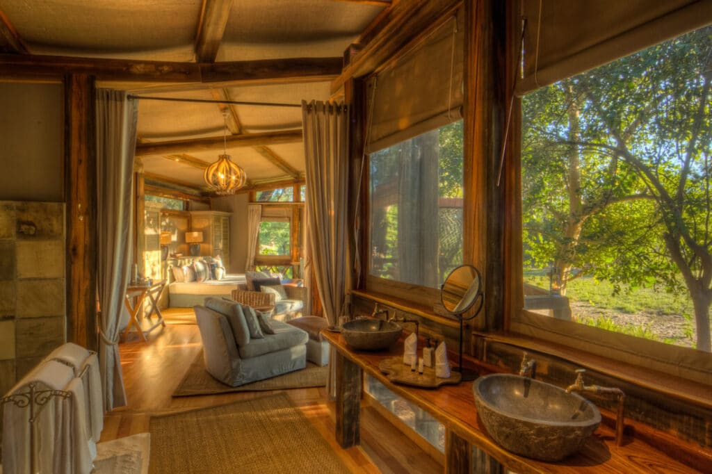 Luxury Botswana safari camp room surrounded by nature