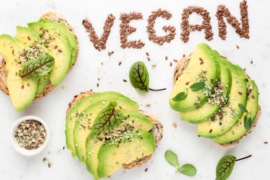 Healthy vegan travel food with avocado toast and seeds