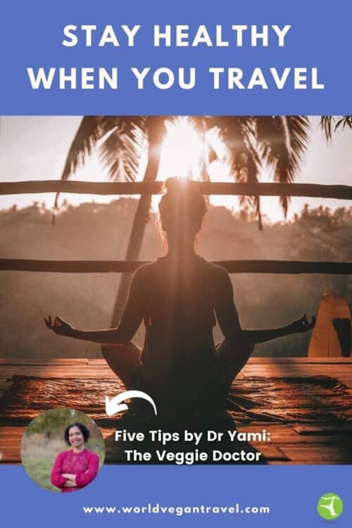 A woman meditating in a tropical place at sunset. Stay healthy when you travel Tips from an MD worldvegantravel.com