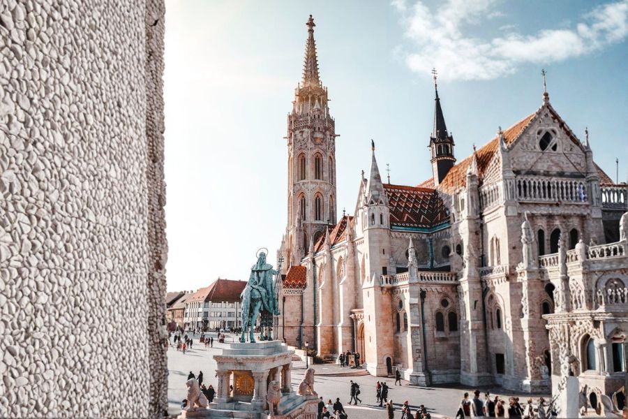 Historic church and statue in Budapest Hungary during vegan travel