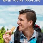 A man eating a protein bar with the text: Everyday VEgan Snacks you can take or buy when you're traveling world vegan travel.com
