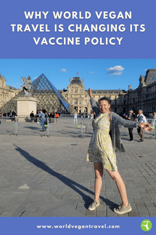 Woman outside Le Louvre Paris with the Text: Why World Vegan Travel is changing its Vaccine Policy
