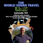 A bald man is smiling cheerfully for the camera; Why You Should add Vegan-Friendly Ethiopia to your Bucket List | Eskinder Hailu Senbeta | Ep 107