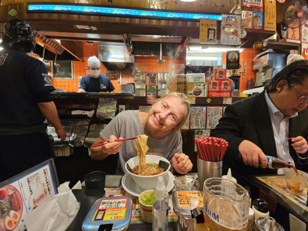 Brighde enjoying ramen during Japan tour
