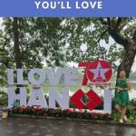 Cover page of blog: Hanoi for Vegans, featuring I love Hanoi Sign with Brighde Founder of World Vegan Travel