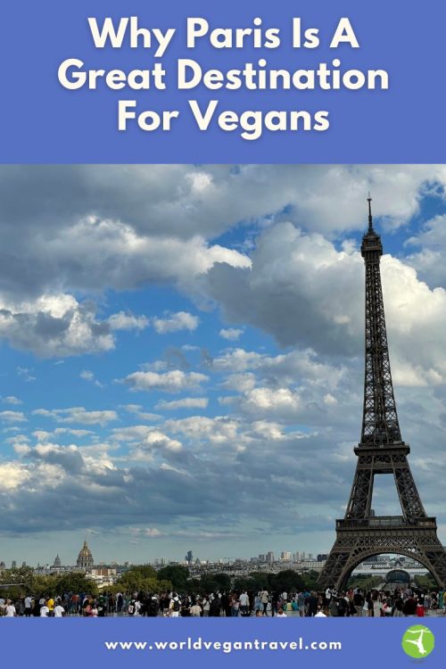 Eiffel Tower in Paris on a sunny day with tourists, a must-visit vegan-friendly destination