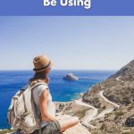 Vegan traveler with backpack enjoying ocean view on a cliff — 7 apps guide by World Vegan Travel