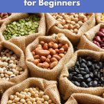 Different types of dried beans, lentils, and split peas displayed in burlap bags.