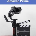 Camera and film clapperboard on a table, used to illustrate vegan documentaries available on Netflix and Amazon Prime.