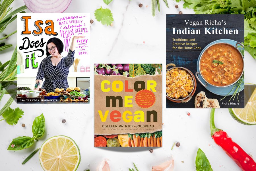 Three colourful vegan cookbooks — Isa Does It, Color Me Vegan, and Vegan Richa’s Indian Kitchen — displayed on a bright food-themed background with fresh veggies.