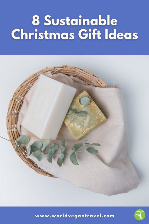 Eco-friendly soaps in a basket with eucalyptus leaves – sustainable Christmas gift ideas from World Vegan Travel.