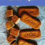Lotus Biscoff cookies and cookie pieces on baking paper for a blog about whether they are vegan.