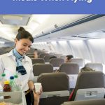 Flight attendant serving drinks on an airplane, showing what to expect when getting vegan meals when flying.