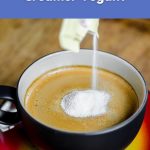 Powdered coffee creamer being poured into a hot cup of coffee