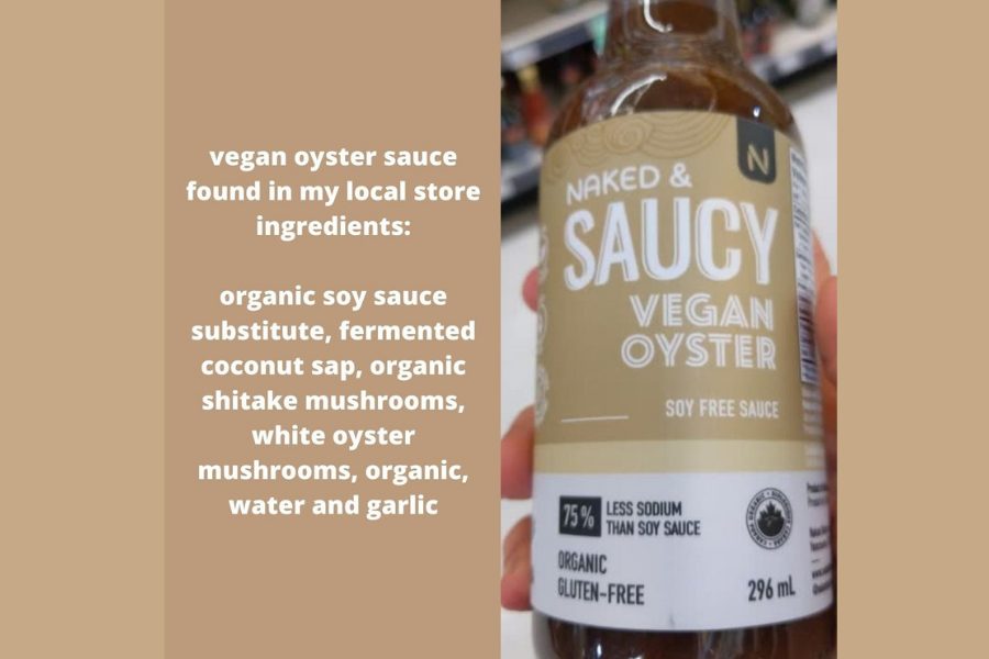A bottle of Naked & Saucy Vegan Oyster Sauce held in a hand, showing the soy-free and gluten-free label.