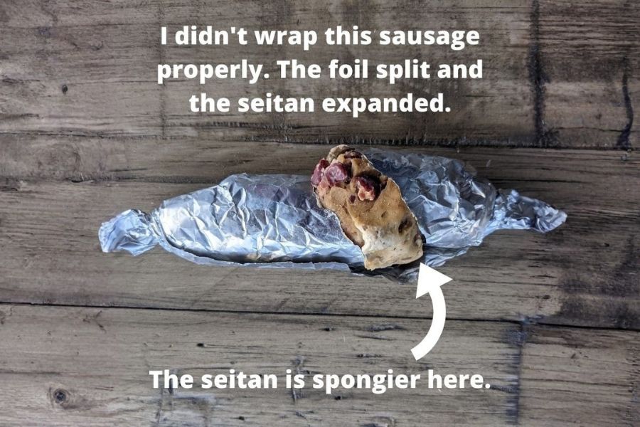 Seitan sausage wrapped incorrectly in foil, showing where the foil split and the seitan became spongy.