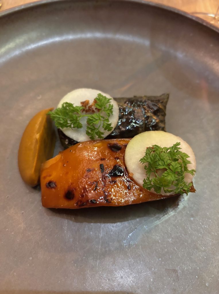 Grilled honeynut squash with kohlrabi and greens at Oyster Oyster in Washington DC.