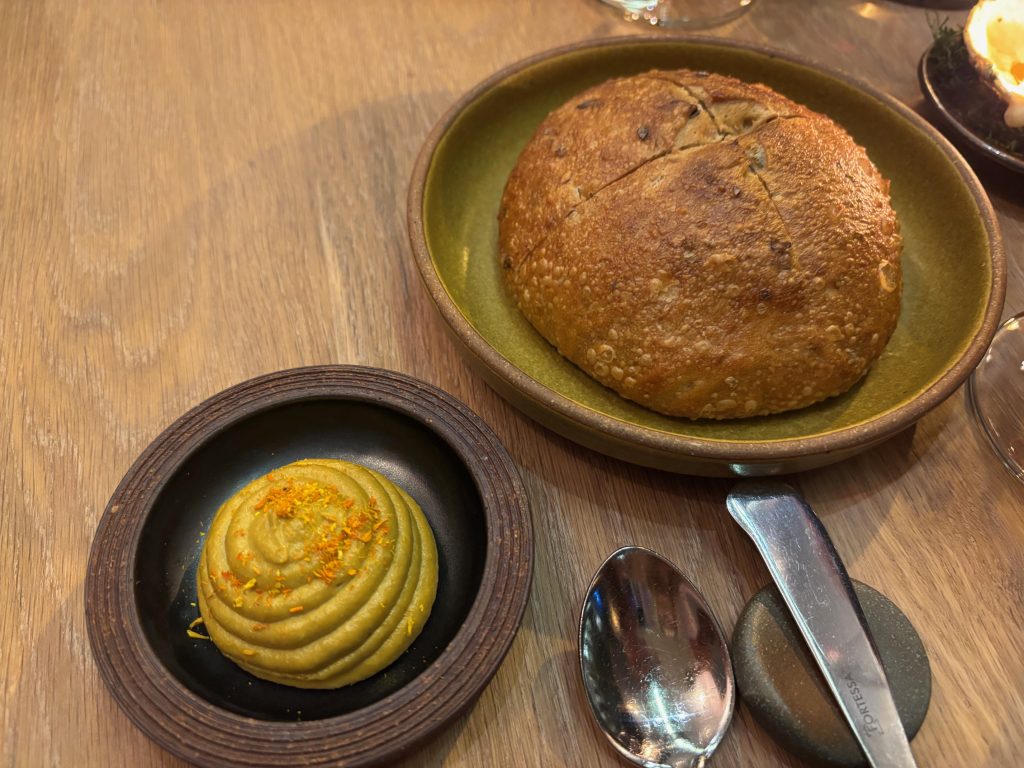 Fresh baked leek bread with vegan marigold butter at Oyster Oyster in DC.