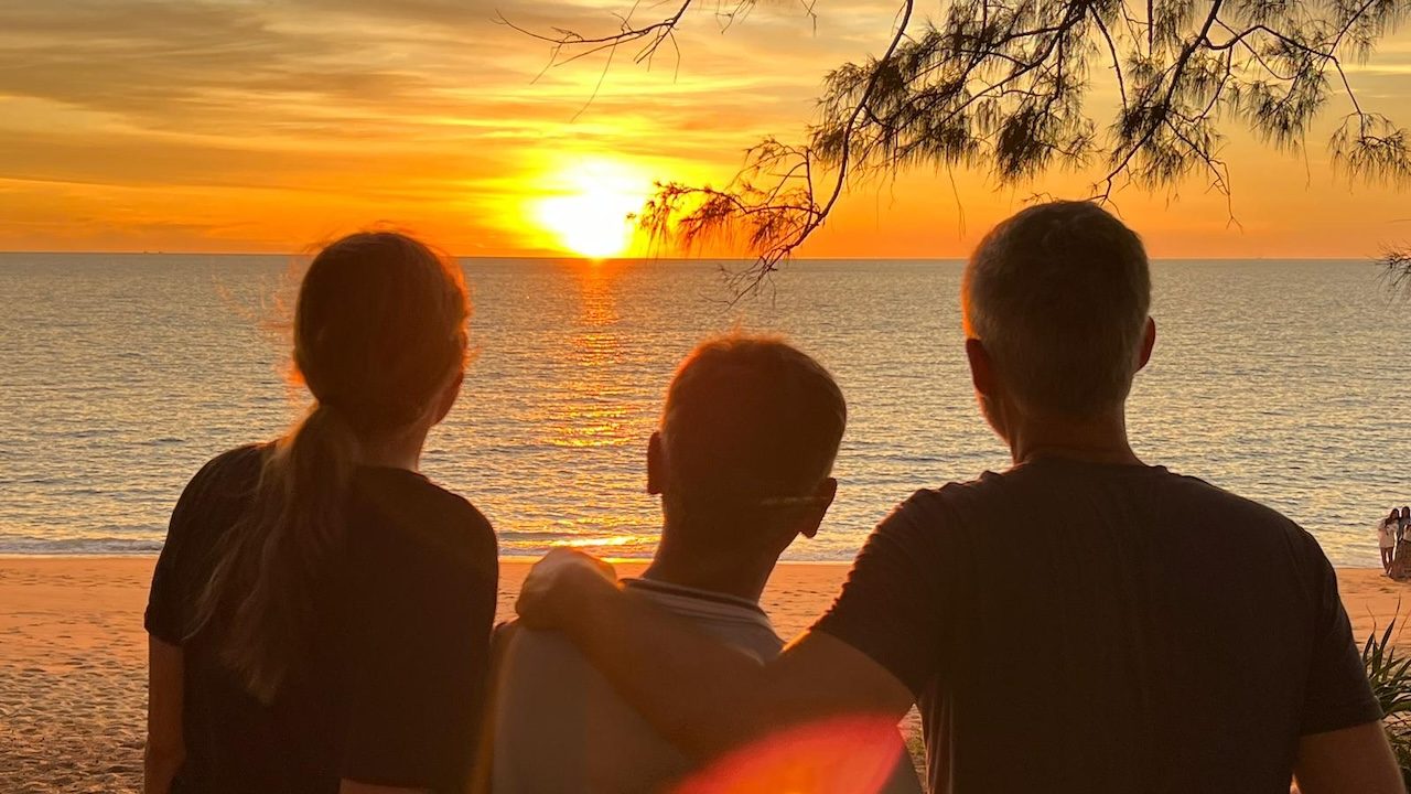 World Vegan Travel group watching a Thailand sunset together on a vegan trip