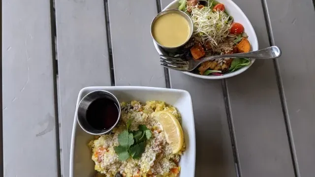 Vegan bowl meal with vegetables, grains, and dressing in Squamish.