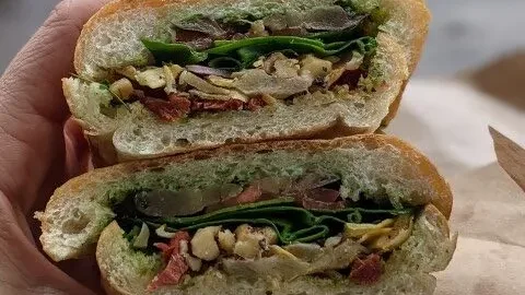Vegan sandwich filled with vegetables and spreads in Squamish.