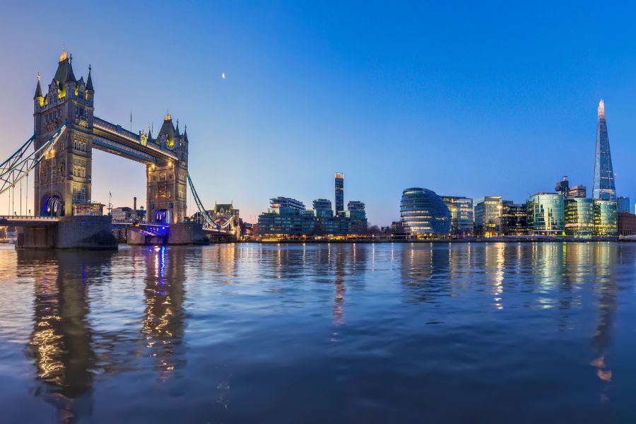 London skyline with Tower Bridge at sunset, showing the city Carla runs through