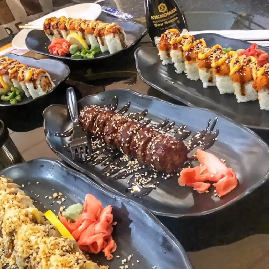 a table with a wide range of vegan sushi