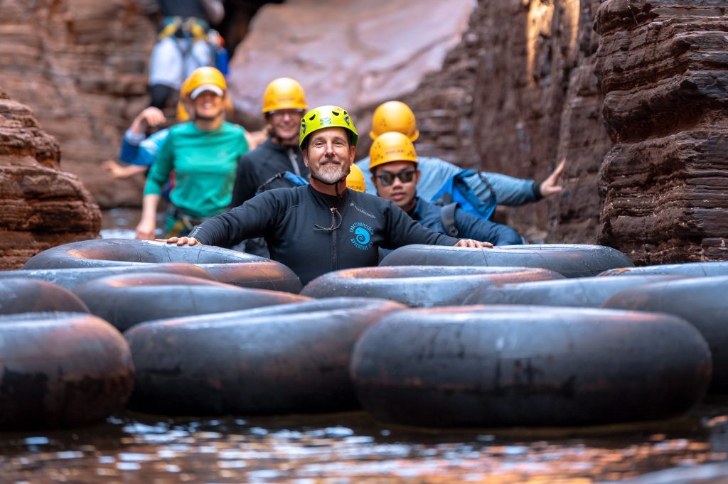 Group canyoning with tubes in Karijini National Park with Spacechameleon Adventure Co