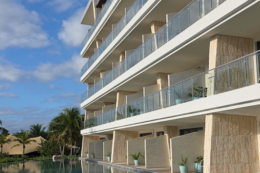 Swim-up rooms and pool at Palmaïa vegan resort in Mexico