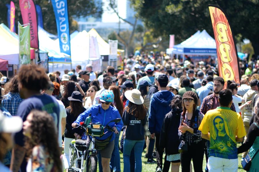 People walking through San Diego vegan events outdoor festival