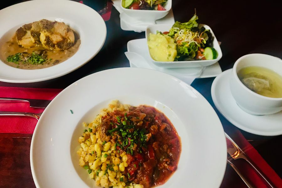 Vegan Bavarian food at Bodhi restaurant in Munich with salad and soup