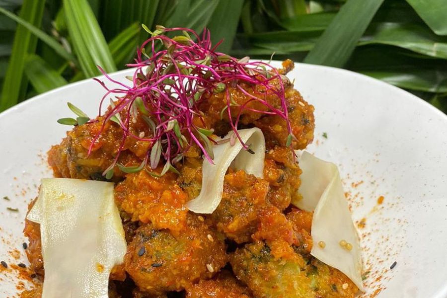 Vegan popcorn broccoli with sauce and fresh garnish in Trinidad and Tobago