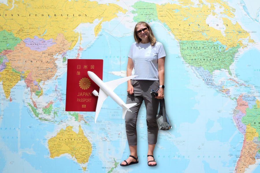 Traveler standing in front of a world map with a Japan passport and airplane graphic.