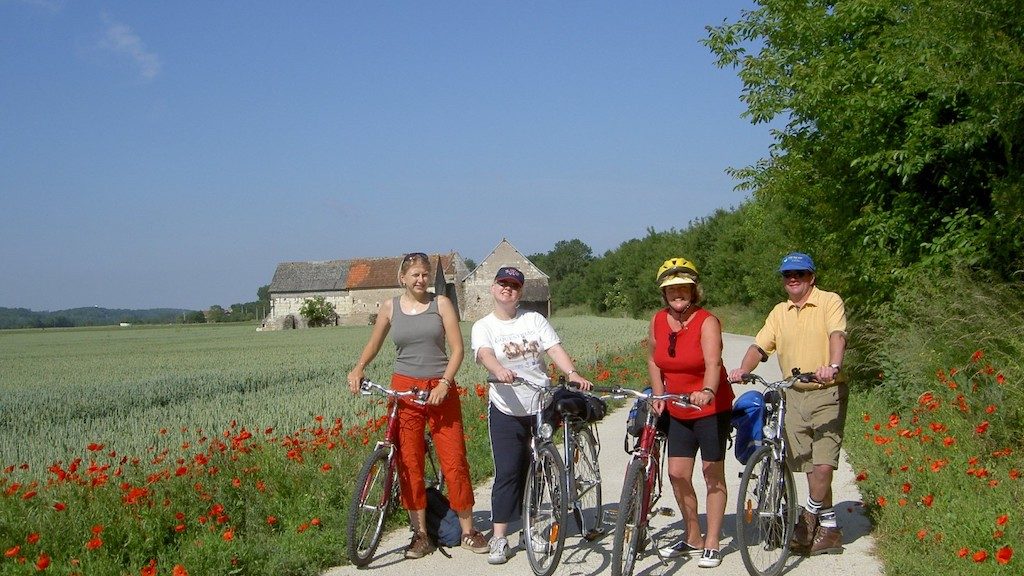 2004 France from Brighde 68 Group travel guests cycling through countryside together