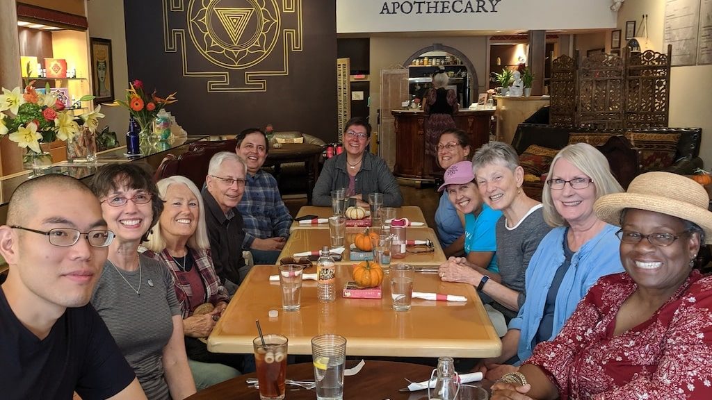 SantaFeGroup 3 copy Group travel guests sharing a meal at a restaurant