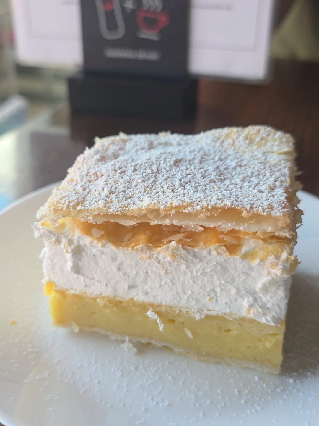 Vegan Bled cream cake with custard, whipped cream, and pastry
