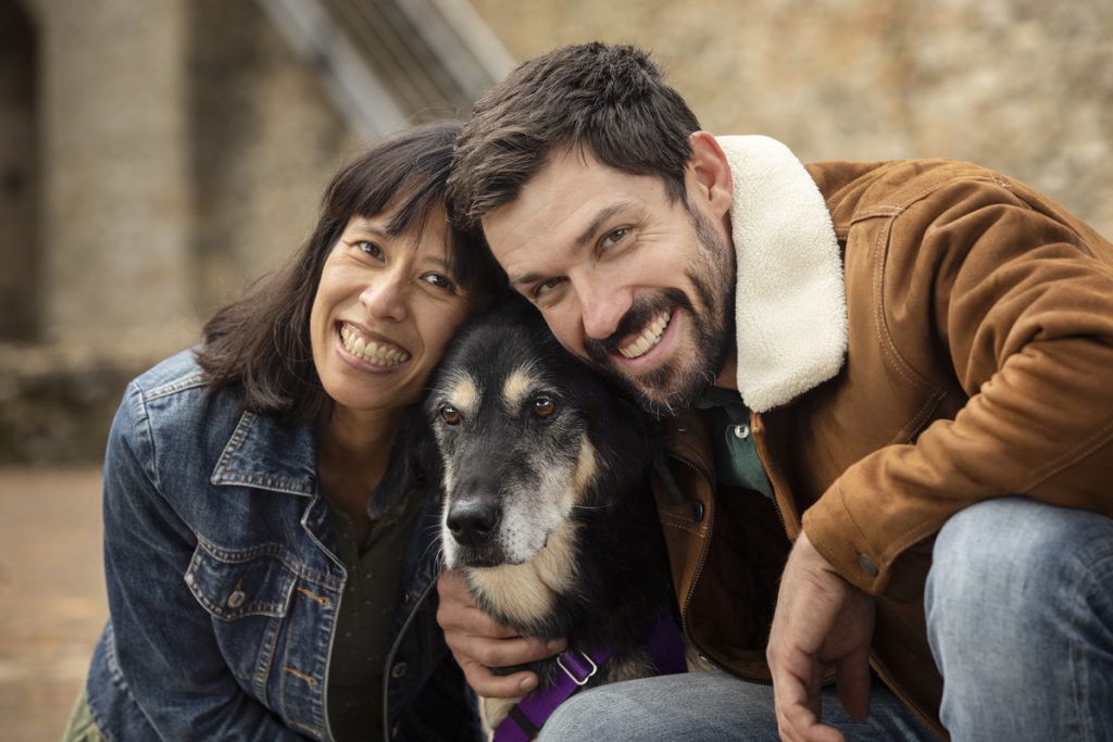 Marie DesRochers and David Binker with their dog at La Grange DesRochers vegan B&B in France