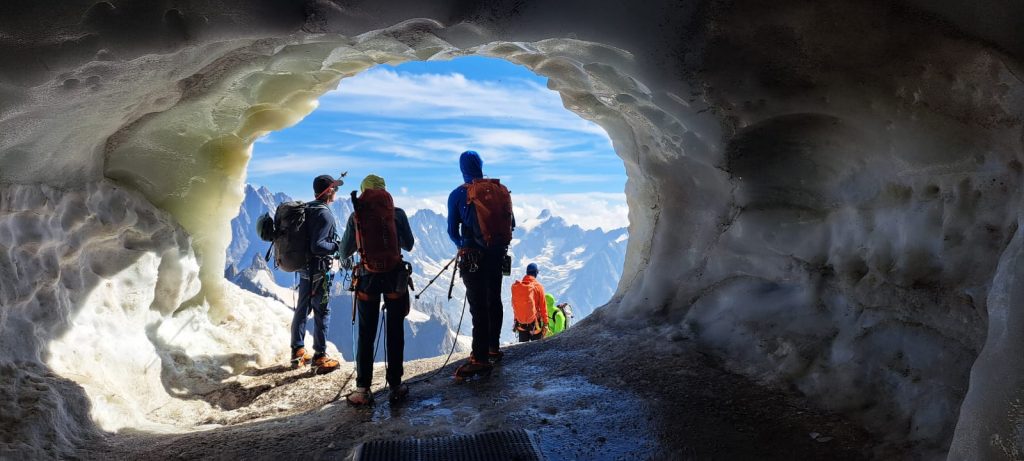 Hikers exploring the French Alps on a mountain adventure